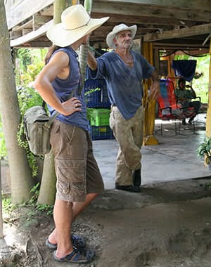 Volunteer Jaime with paca farmer